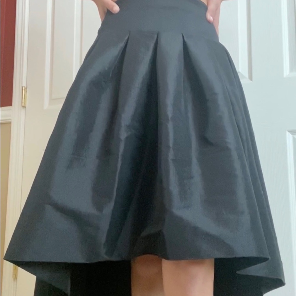 black short to long black puffy skirt